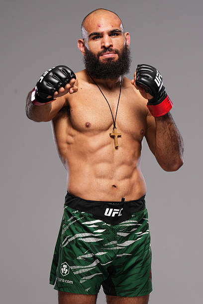 Lead pastor of Gifted Ministry, a professional fighter, wearing a wooden cross